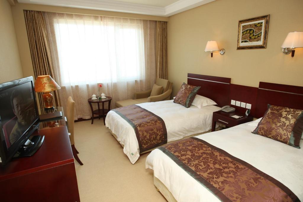 Overseas Chinese International Hotel Thanh Đảo Ngoại thất bức ảnh